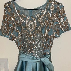 Beautiful teal and gold high low satin dress